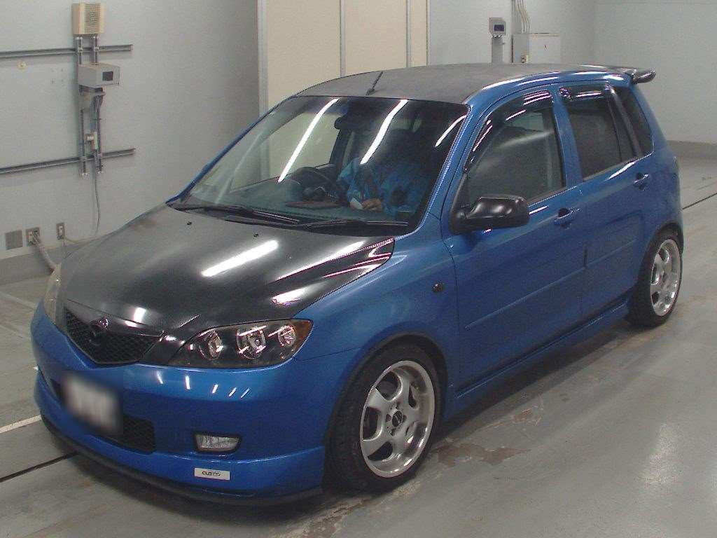 2002 Mazda Demio DY5W[0]