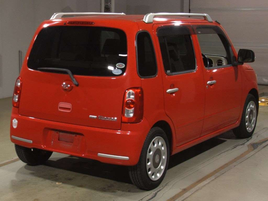 2009 Daihatsu Mira Cocoa L675S[1]