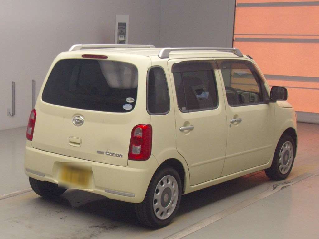 2009 Daihatsu Mira Cocoa L675S[1]